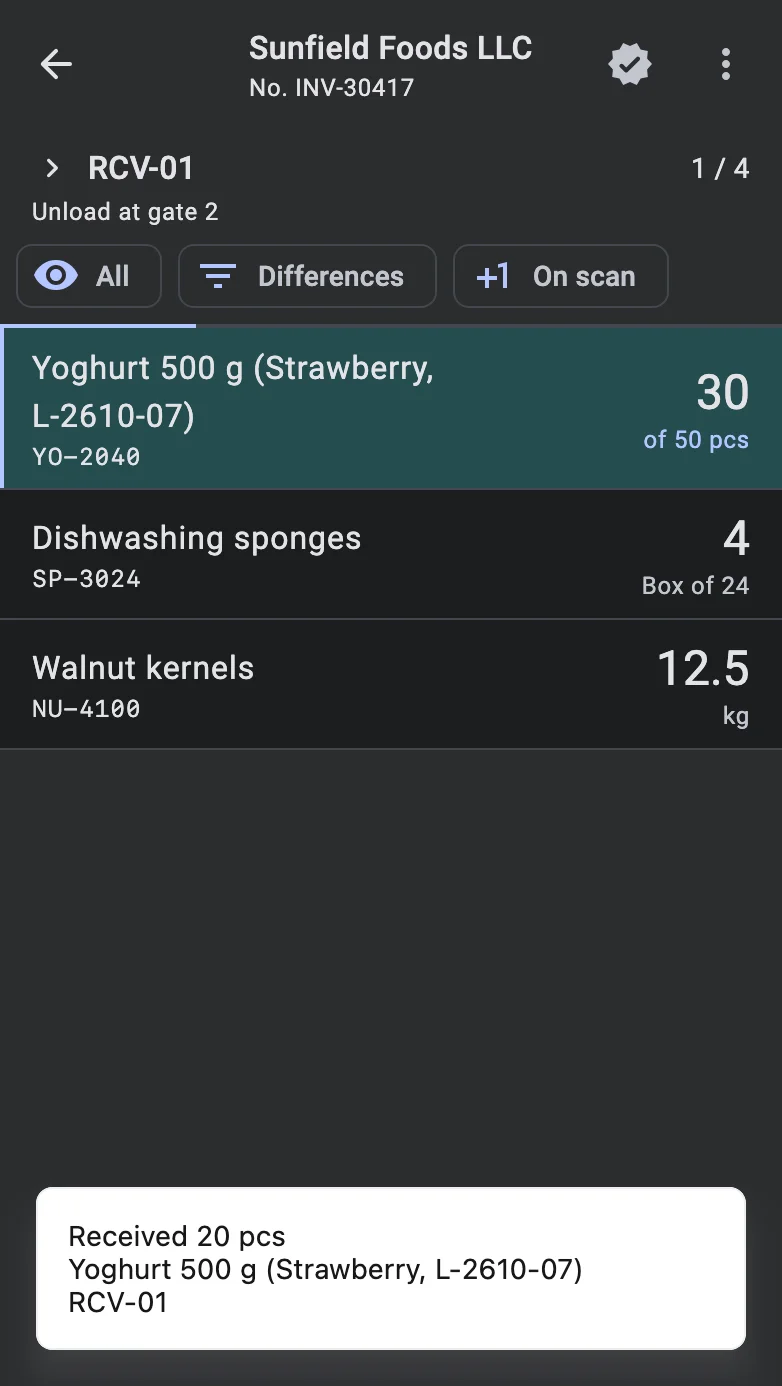 The line list right after a save, with the Received message at the bottom naming the quantity, the product and the location