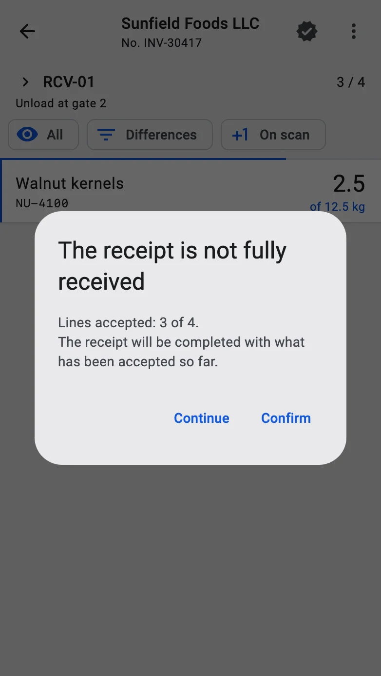 The dialog saying the receipt is not fully received, with the accepted lines count and the Confirm and Continue buttons